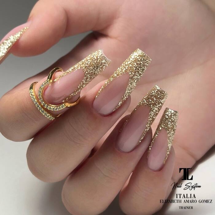 Wedding mani with gold glitter french tips
