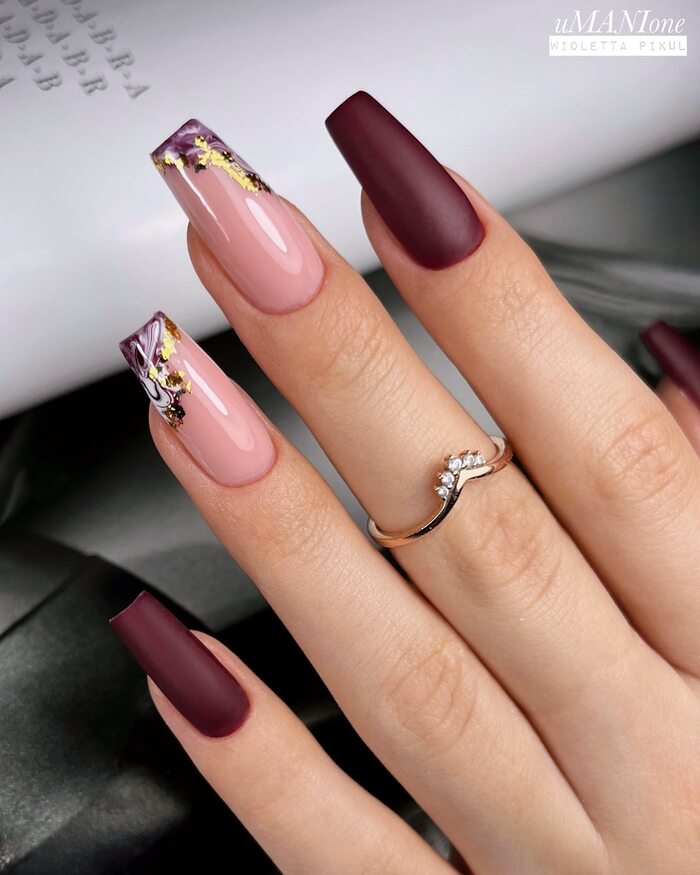 Matte burgundy and glossy pink nail combination 