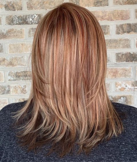 Brown hair with blonde and red highlights