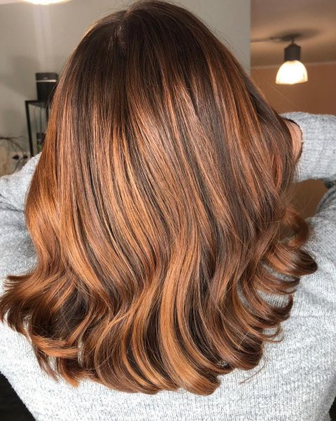short length brown hair with caramel highlights