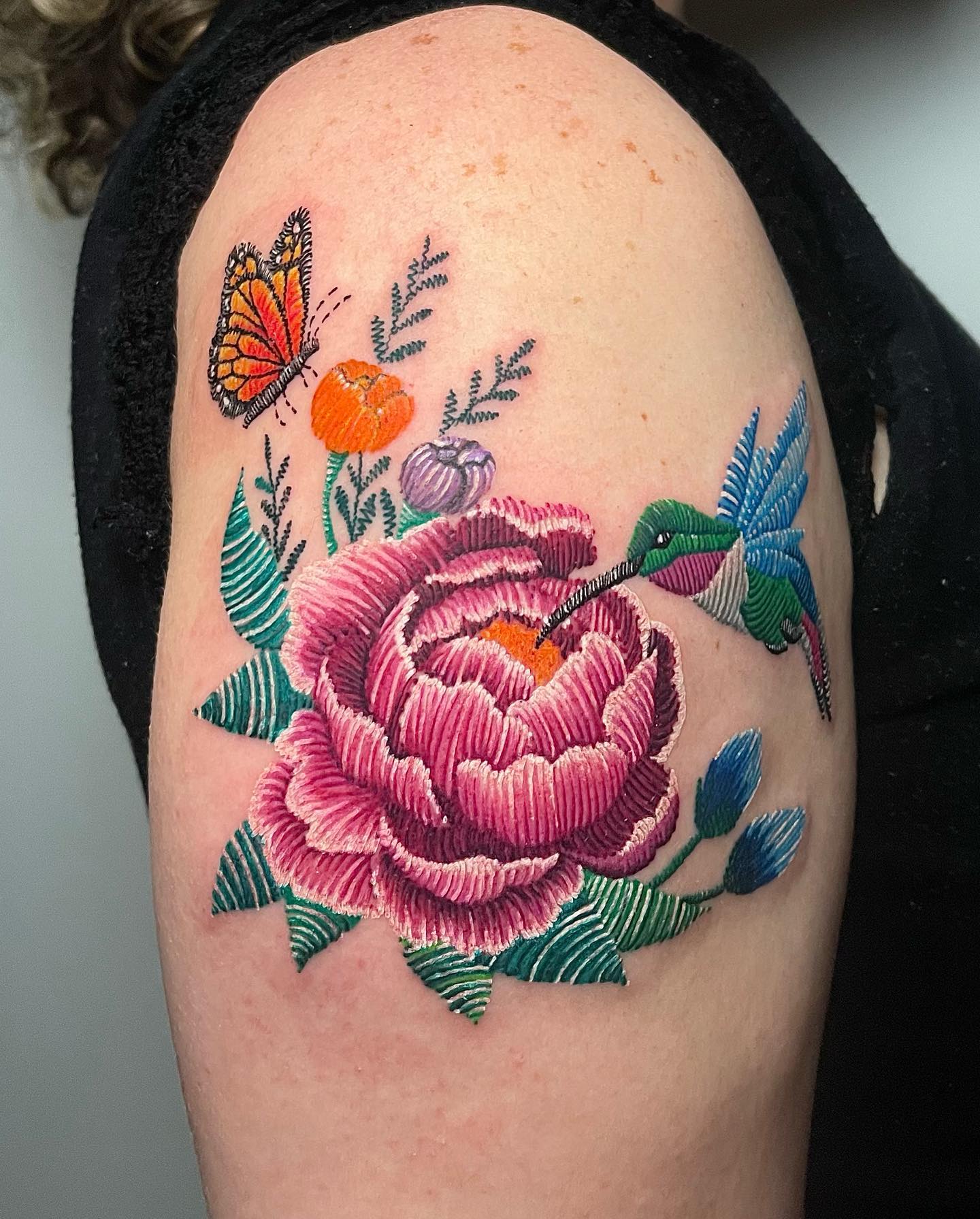 Peony flower embroidery tattoo composition on shoulder