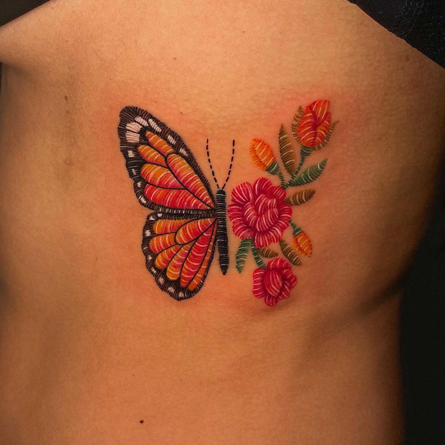 Butterfly and flowers tattoo composition 