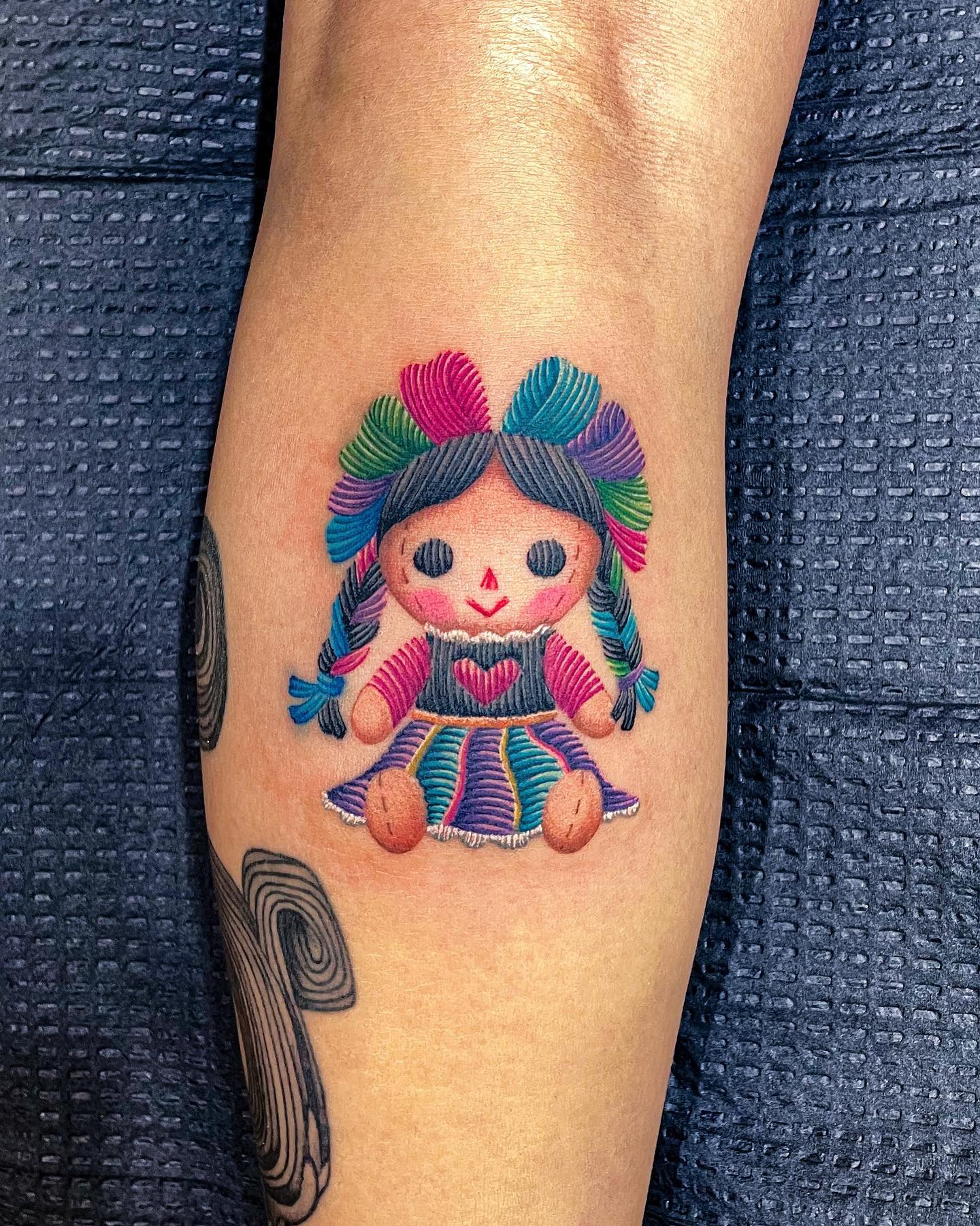Mexikanisches Stickerei-Tattoo der Lele-Puppe