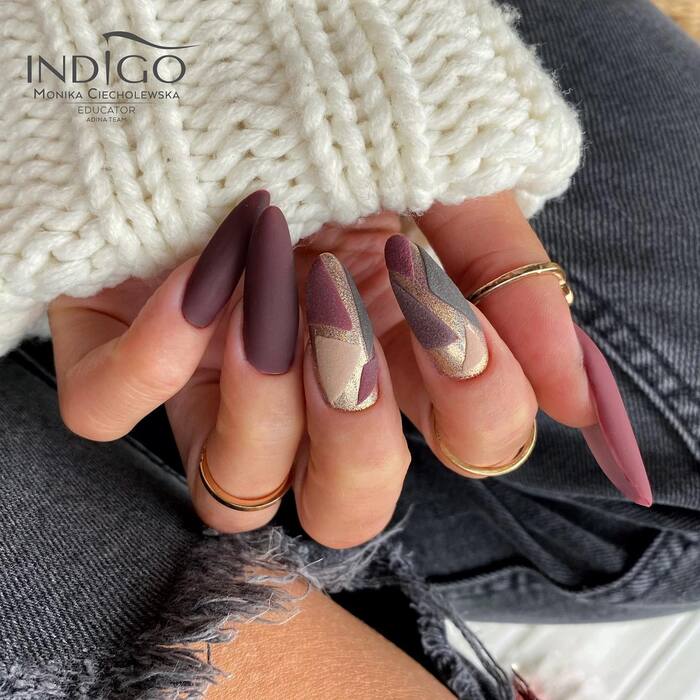Close-up photo of Matte Maroon Almond Fall Nails