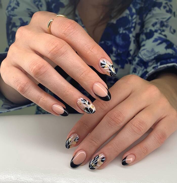 Close-up photo of Short French Tip Nails With Fall Paintings