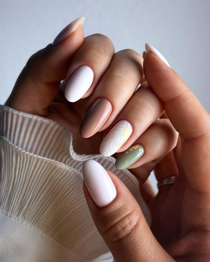 Close-up photo of White Fall Manicure With Lace Accent