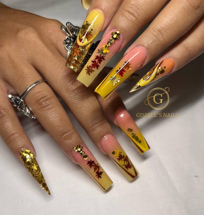 Close-up photo of Long Coffin Nails With Fallen Leaves