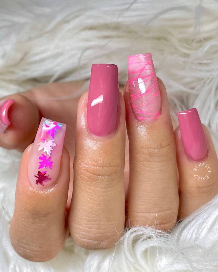 Close-up photo of Barbie Pink Manicure With Fall Leaves
