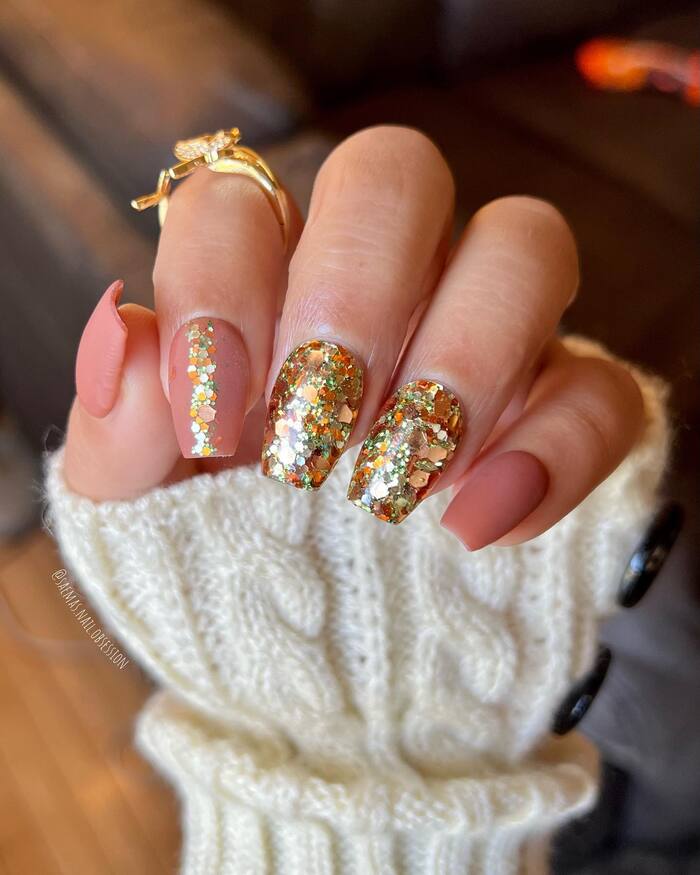 Close-up photo of Simple Fall Manicure With Glitter