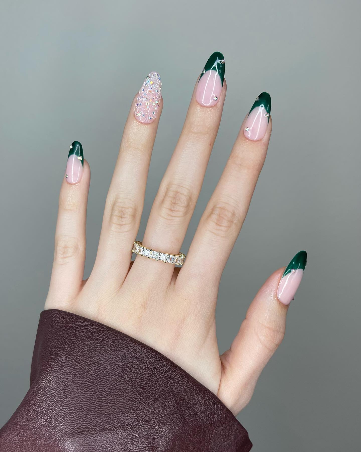 Dark Green French Tip Nails with white rhinestones