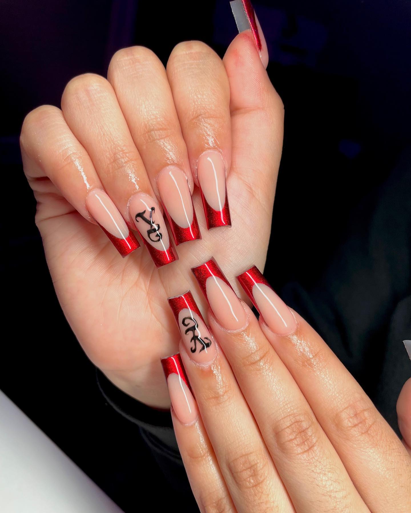 Red Chrome French Tip Nails with black character on ring finger