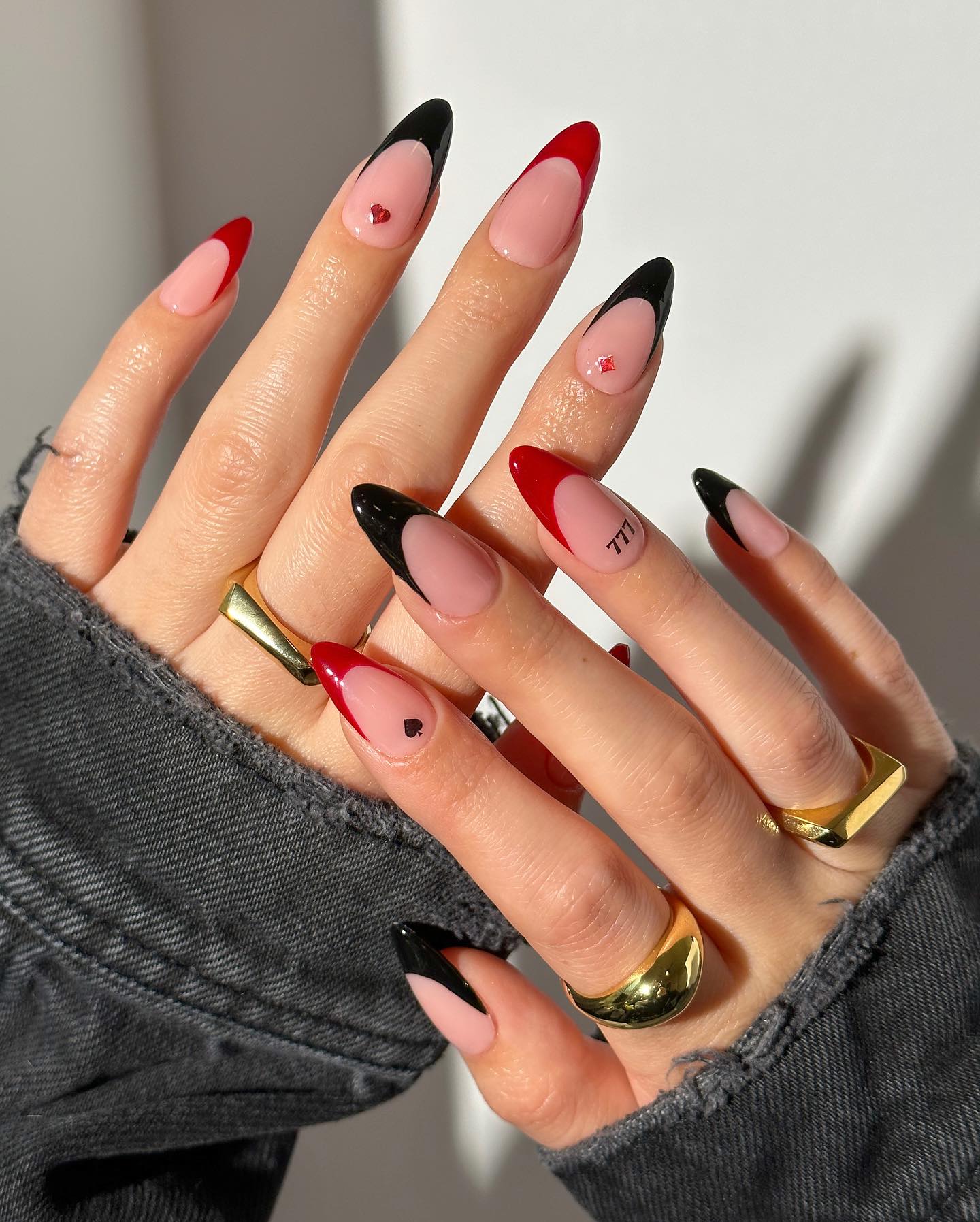 Red And Black French Tip Nails with card symbols