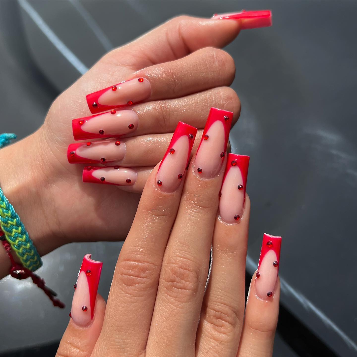 French Tip Coffin Nails With small red Diamonds