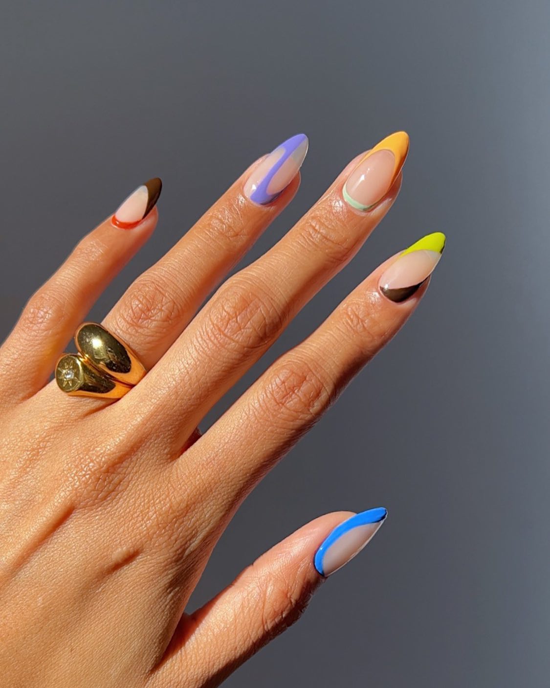 Rainbow nails with abstract design