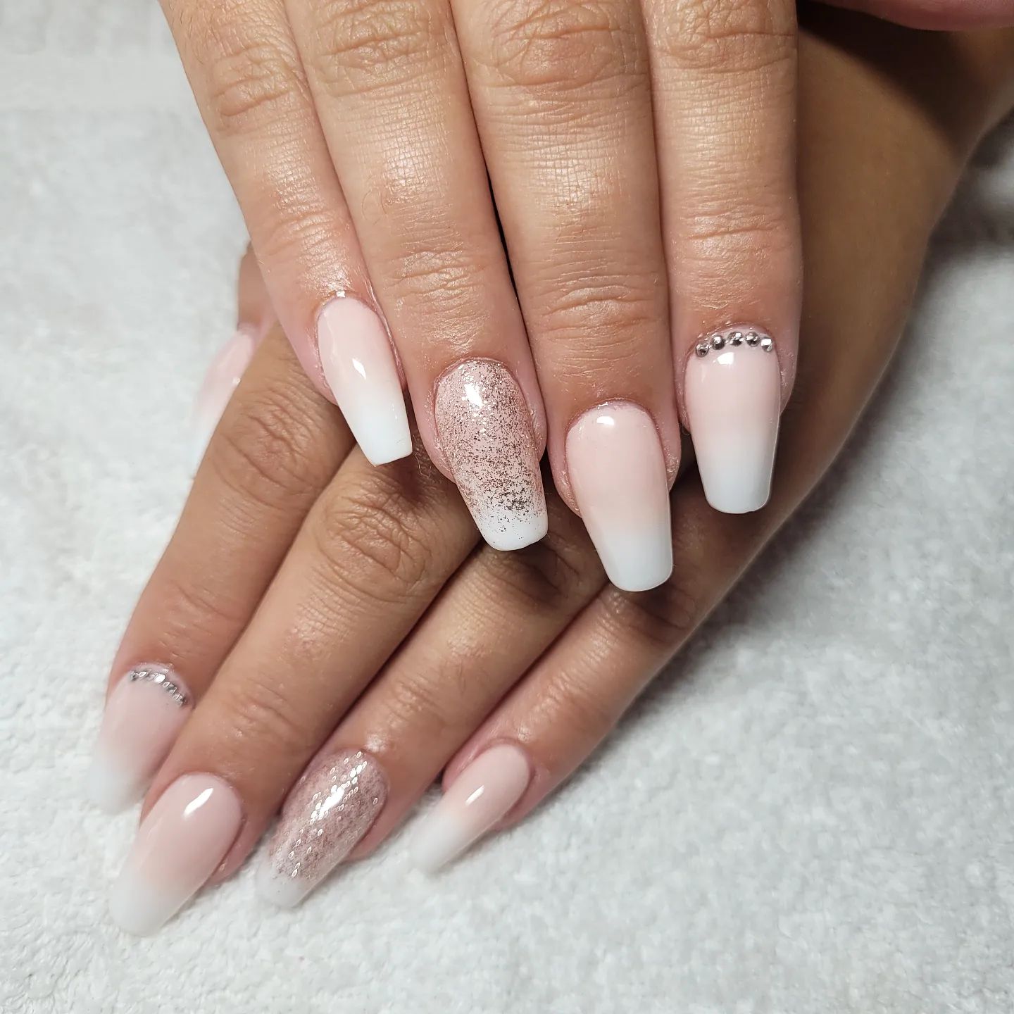 French ombre nails with glitter and diamonds