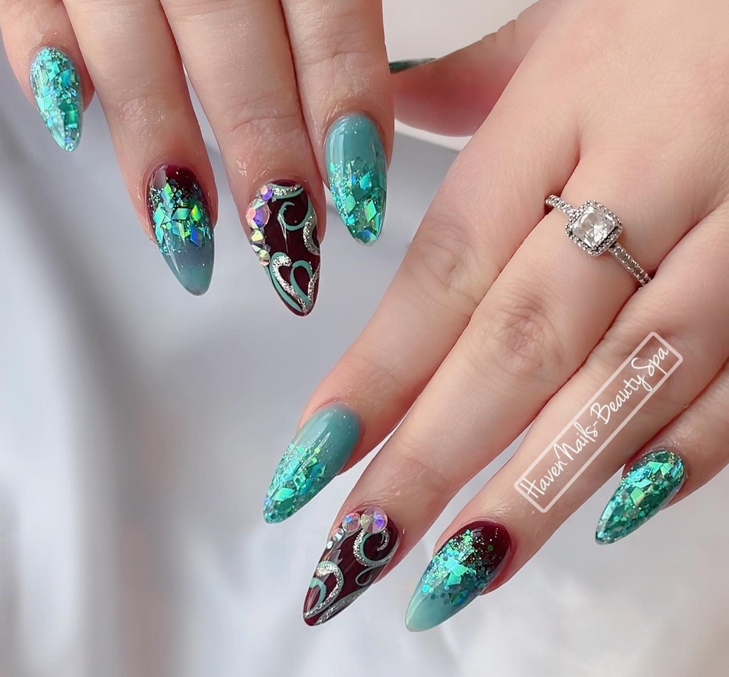 Green french ombre design with glitter