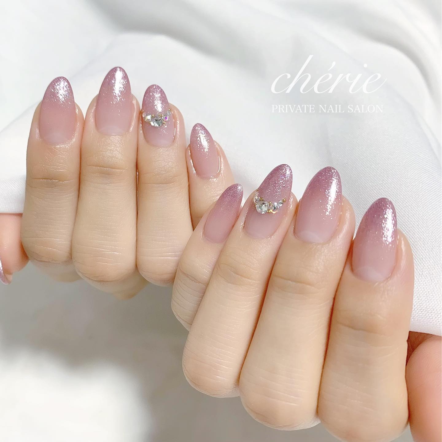 Beige ombre french manicure on almond nails