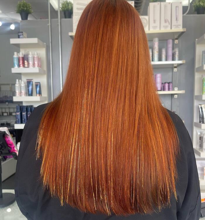 Оранжевый блеск на рыжих волосах