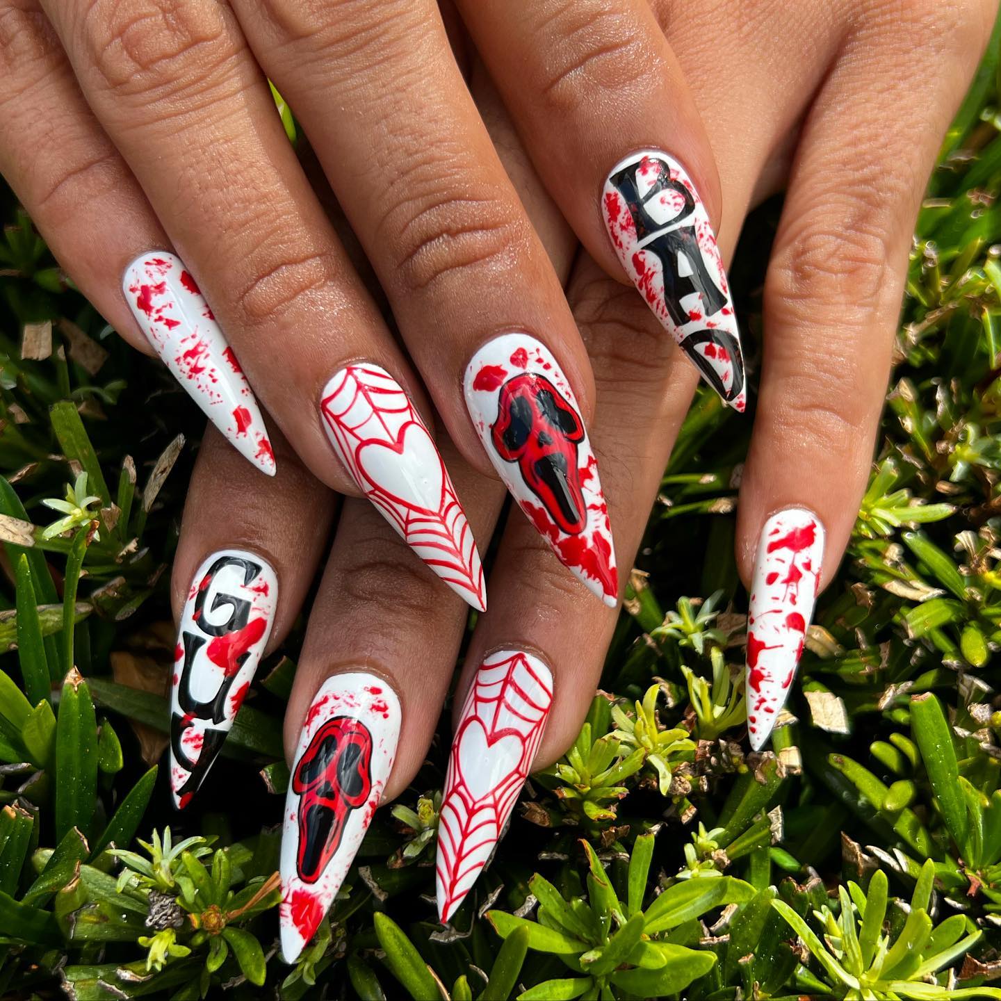 Halloween manicure with paintings with famous mask from Scream movie