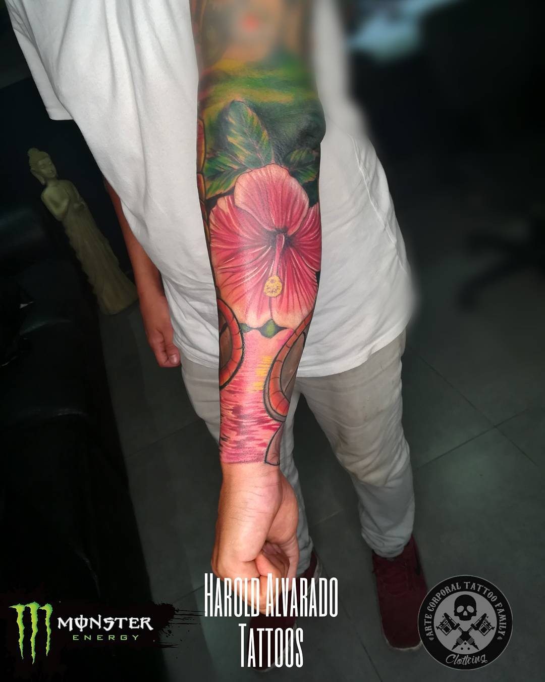 red hibiscus sleeve tattoos