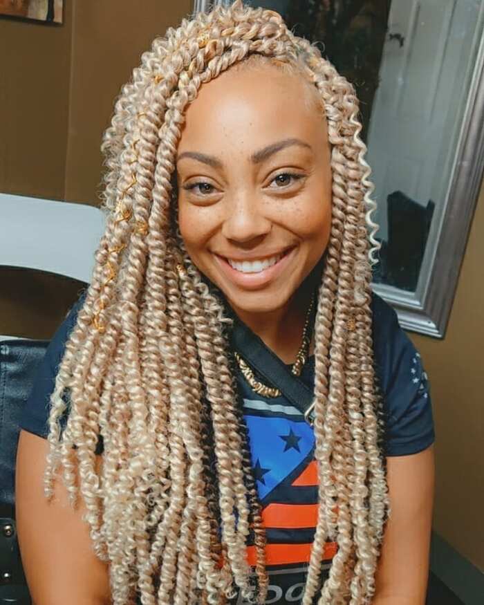 One side hairstyle with honey blonde soft locs