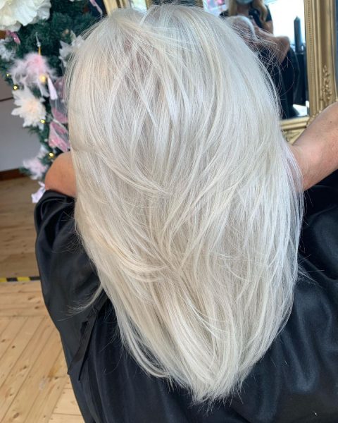 Long layered white blonde hair