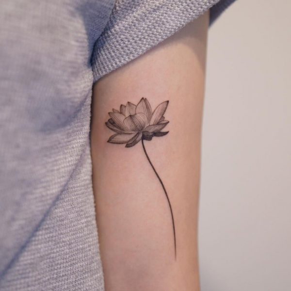 Tiny Arm Lotus Tattoo