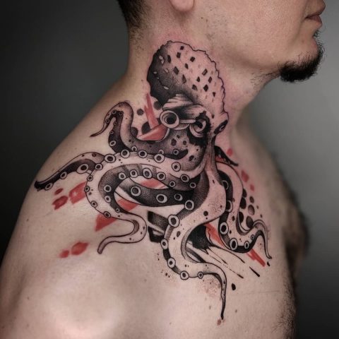 Japoński tatuaż z czerwoną i czarną ośmiornicą