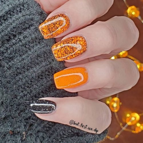 Orange und graue Nägel