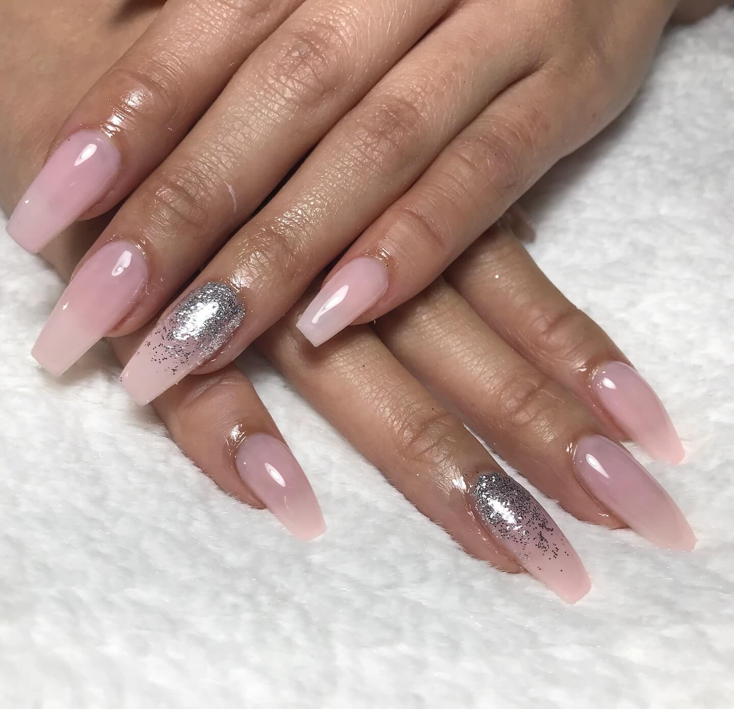 baby pink nails with silver glitter