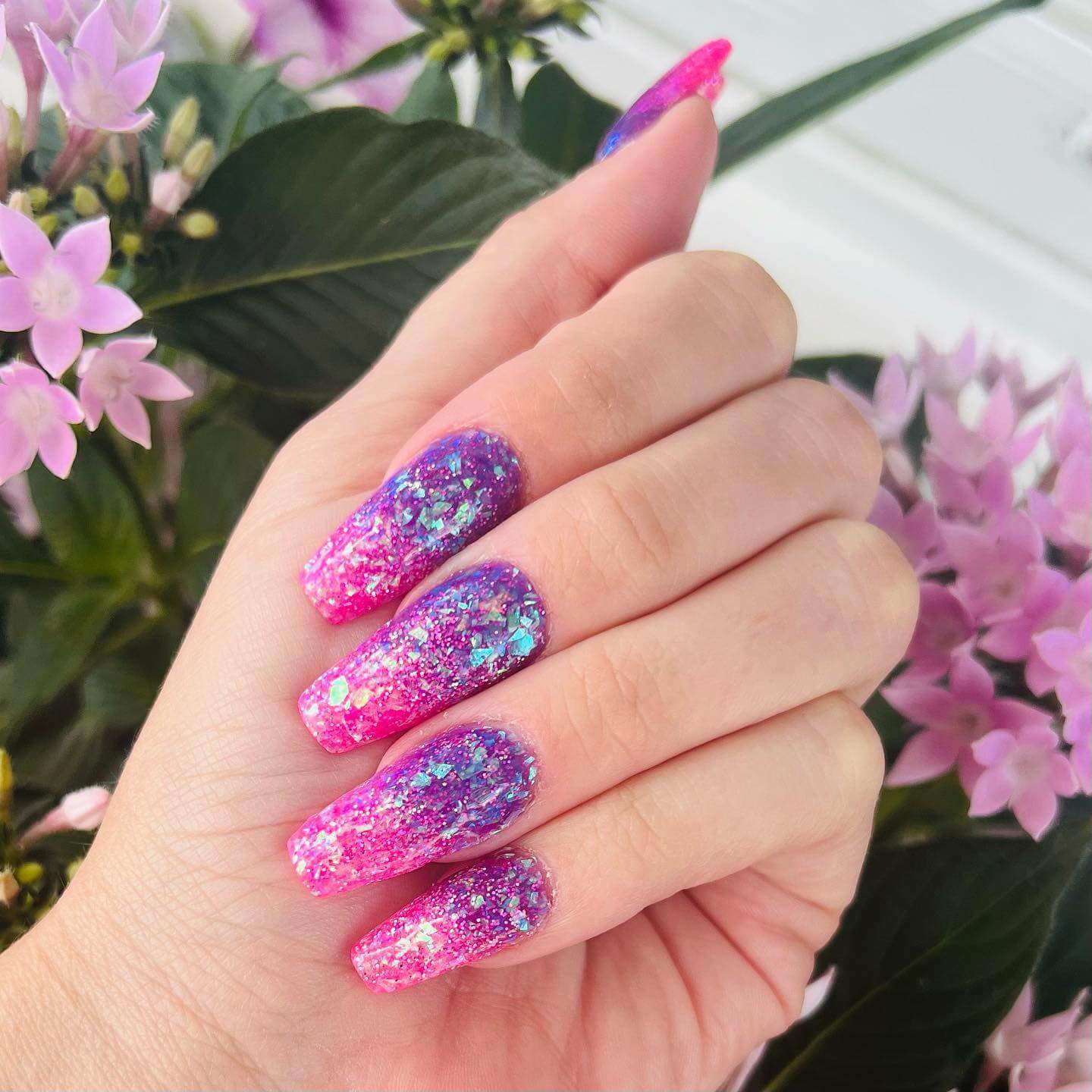 pink and purple nails with glitter