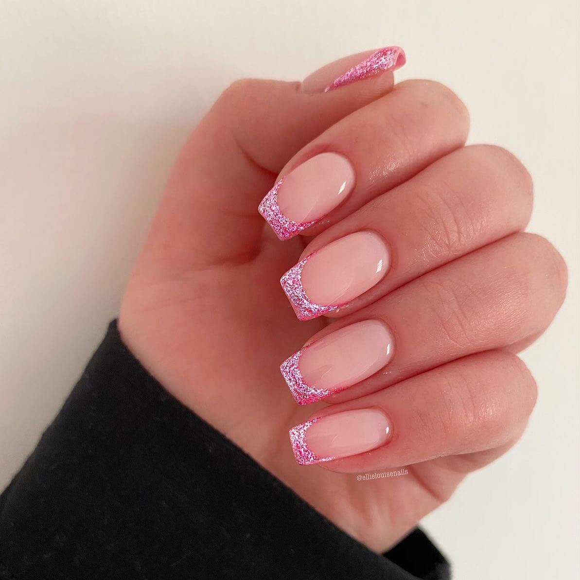 soft pink manicure with glittery tips