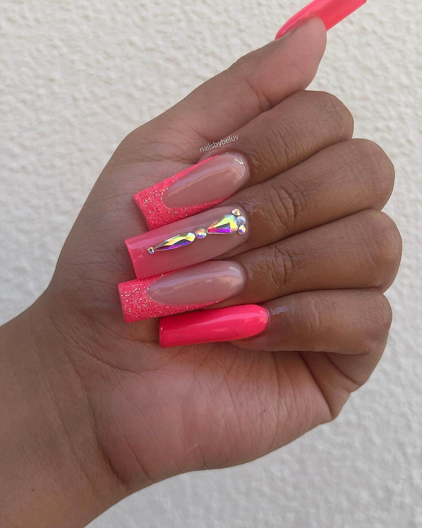 hot pink nails with diamonds
