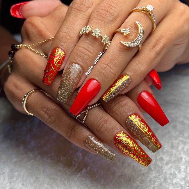 Red Nails with Gold Decoration