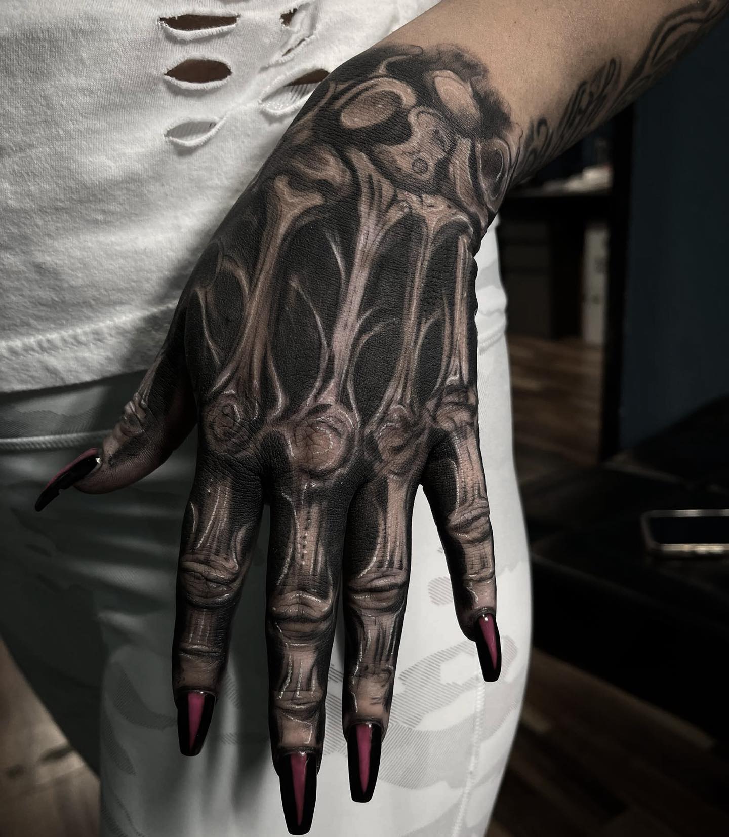 61 Skeleton Hand Tattoo Ideas With Deep Meanings