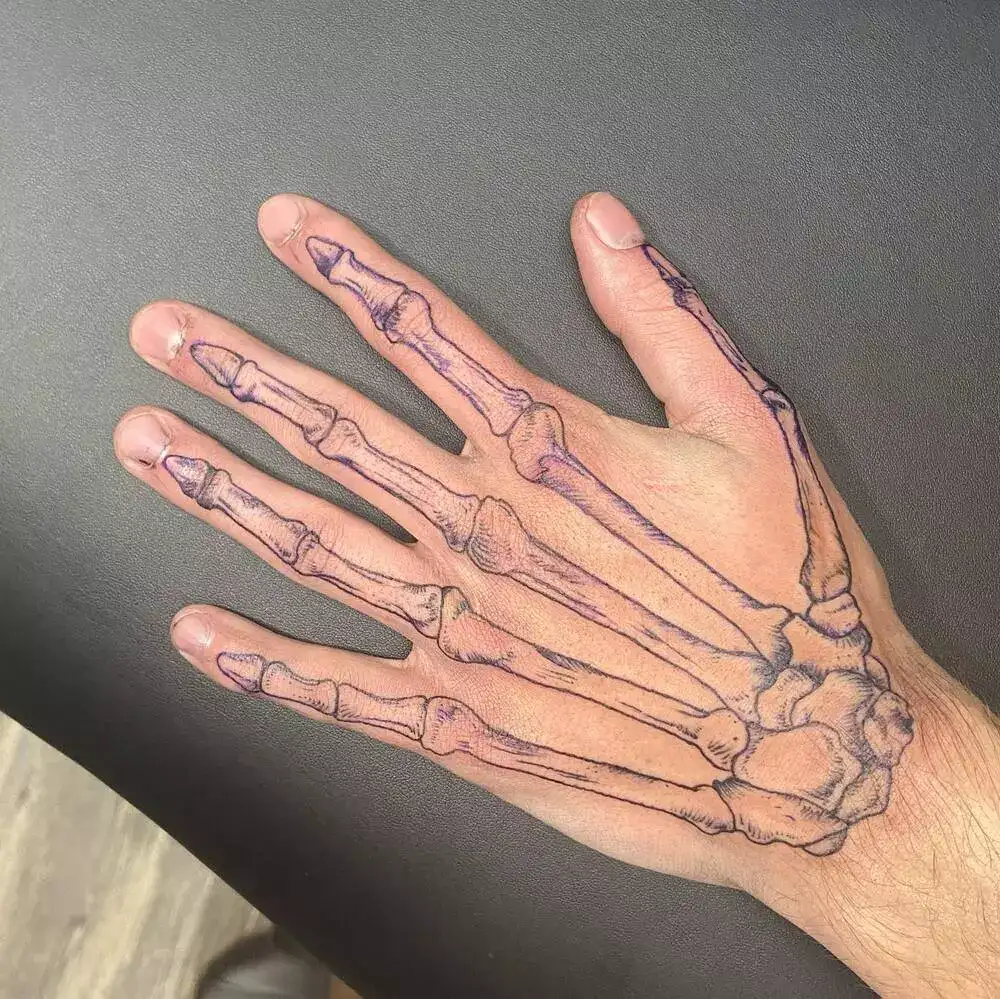 Fine Line Skeleton Bone Hand Tattoo Example