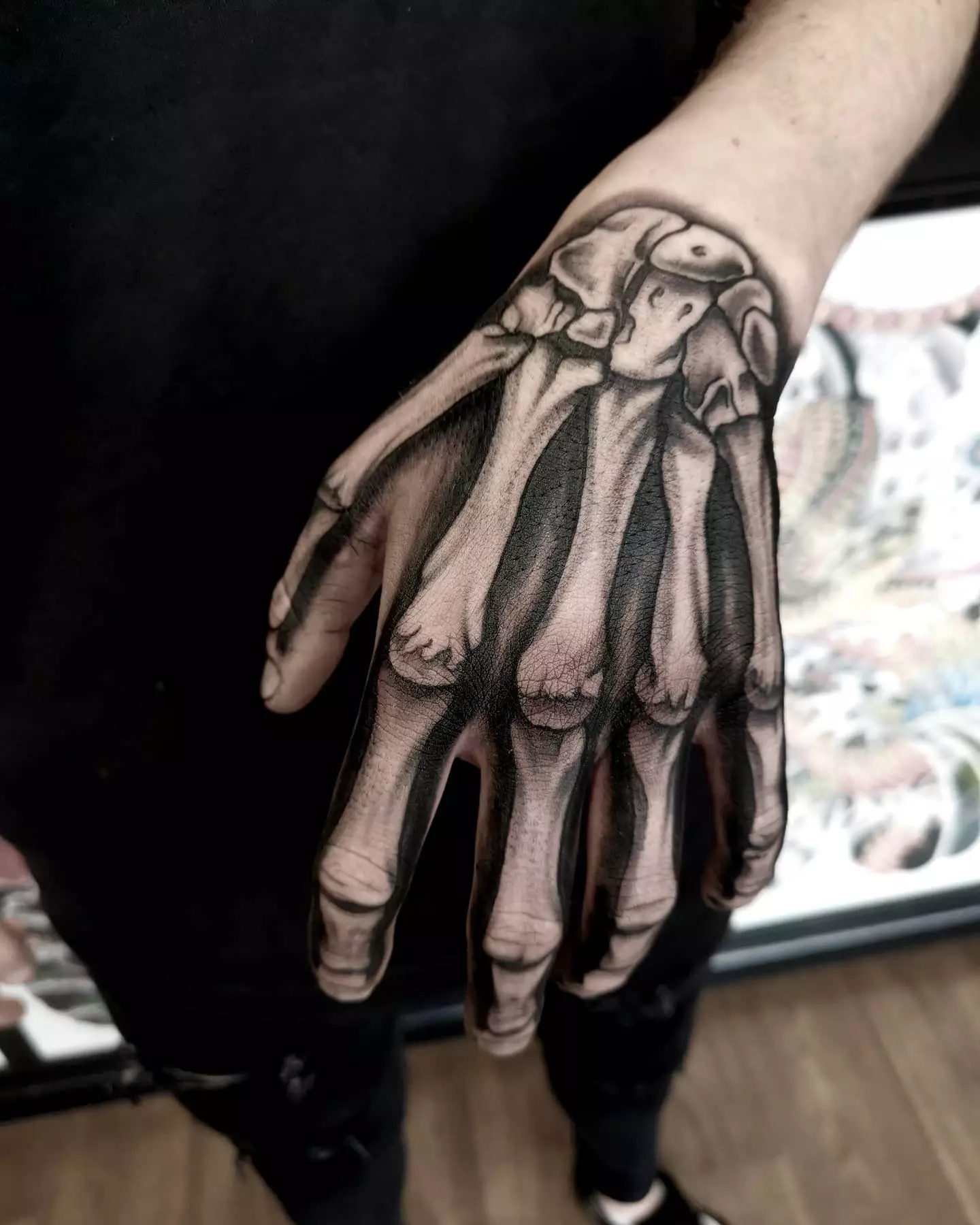 A Close-up Photo of Skeleton Bone Hand Realism Tattoo