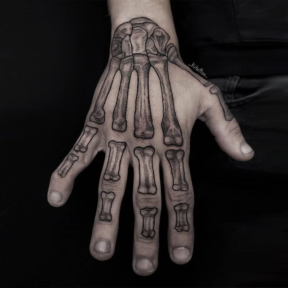 Black And Gray Skeleton Hand Tattoo 