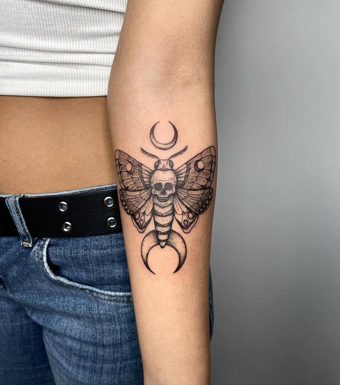 Skull and Moth Forearm Tattoo