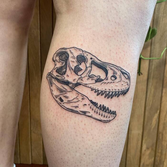 Dinosaur Skull Tattoo On Leg 
