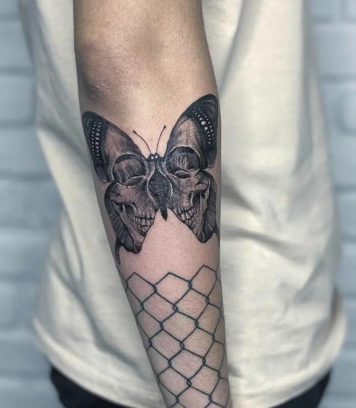 Skull Butterfly Blackwork Tattoo