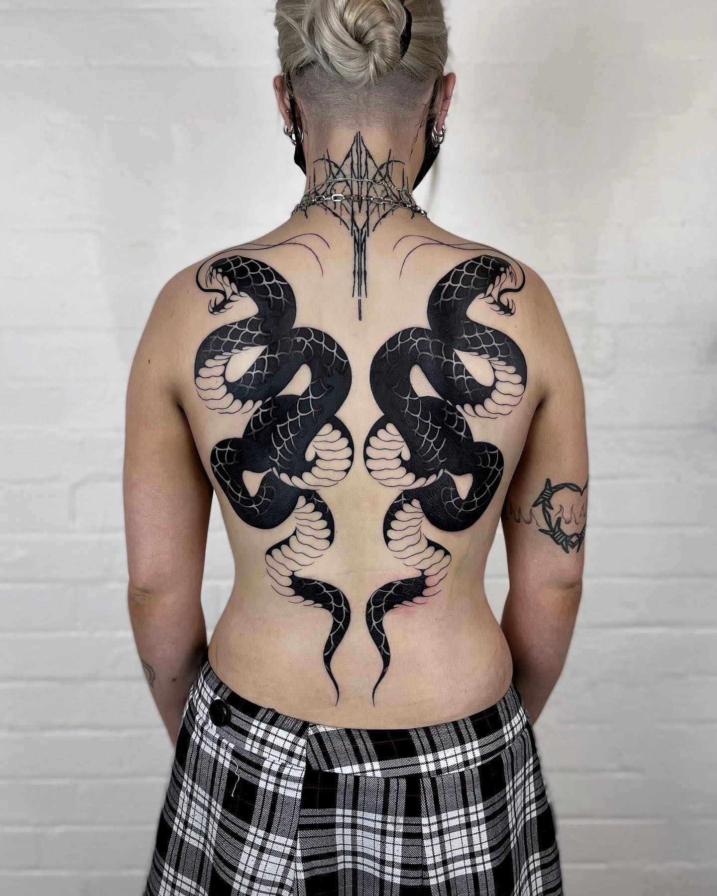 Schlangen-Rücken-Tattoo
