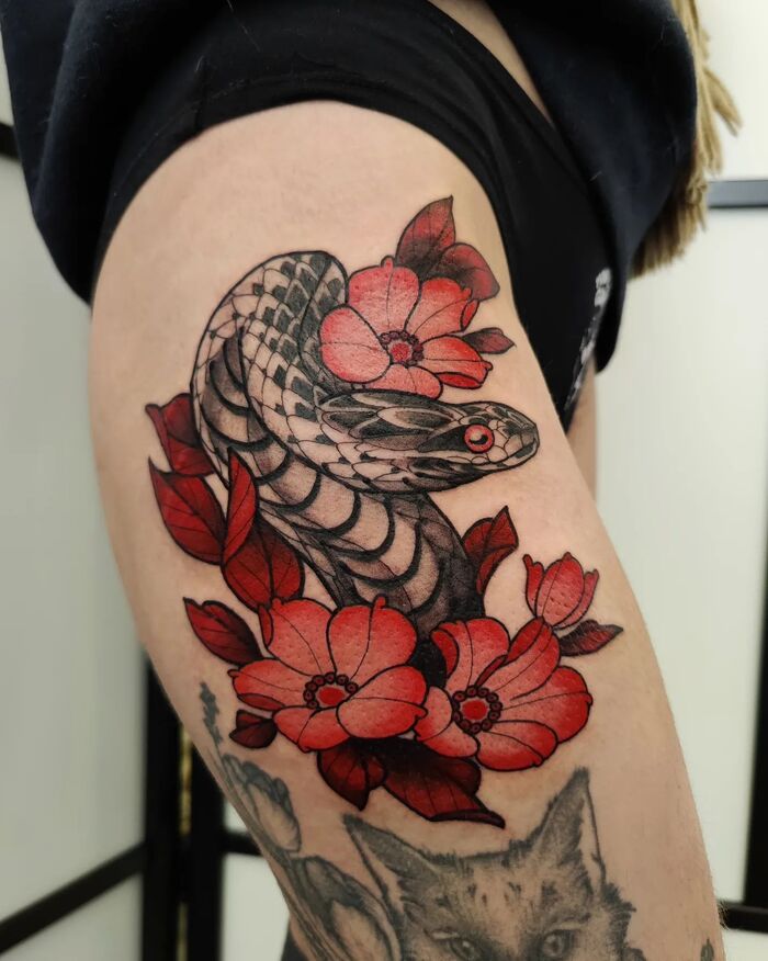 Close-up Image of the Black Snake Floral Tattoo