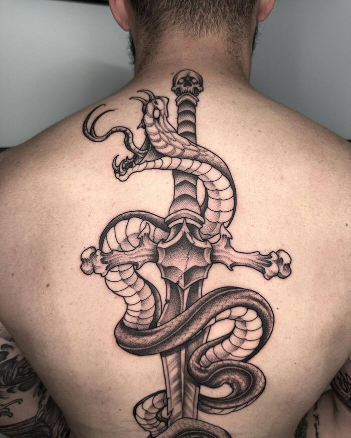 Close-up Image of the Rattlesnake And Sword Tattoo