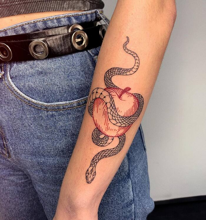 Close-up Image of the Snake And Apple Tattoo