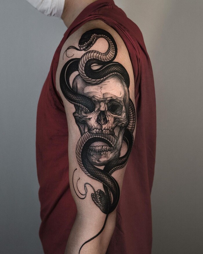 snake arm tattoo