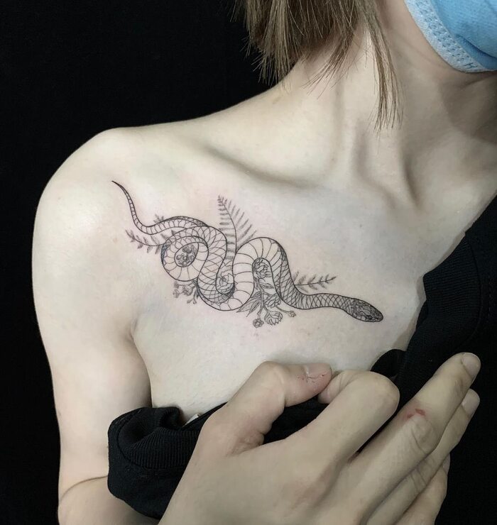 Close-up Image of the Floral Fine Line Snake Tattoo