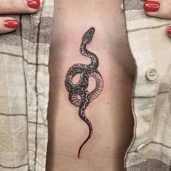 Snake Sternum Tattoo