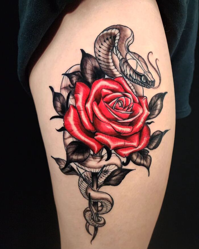 Close-up Image of the Red Rose and Snake Tattoo