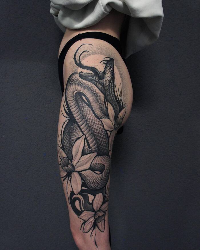 Close-up Image of the Realistic Rattlesnake Thigh Tattoo 